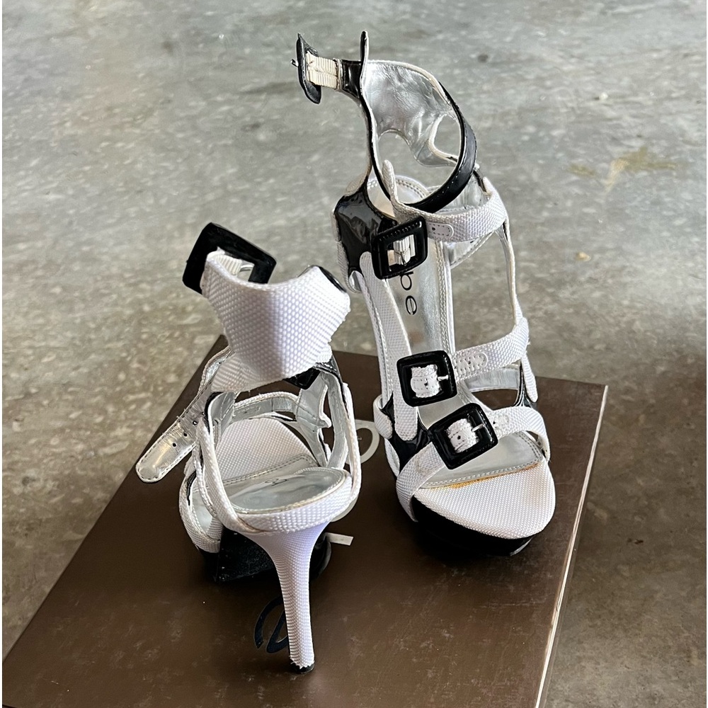 Back and white strap heels.